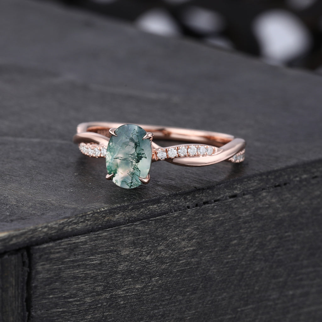 Oval Cut Moss Agate EngagementRing With Unique Crossover Shank